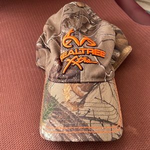Real tree, extras S – M signature stretch, hat, camouflage with orange stitch